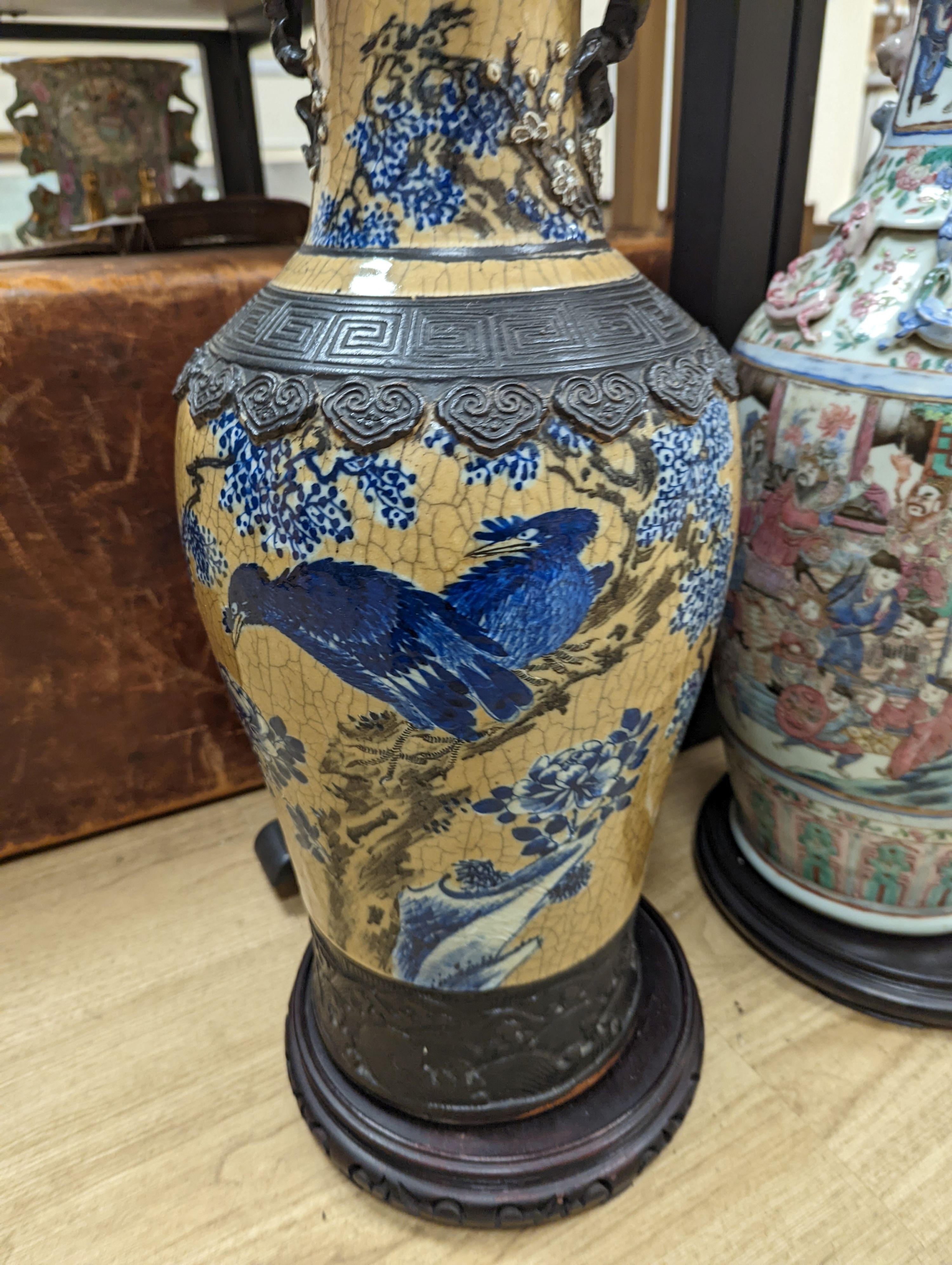 A large Chinese crackle glaze vase, late 19th/early 20th century and a large Chinese famille rose vase, late 19th century, tallest 60 cm.